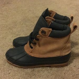 Green and tan duck boots